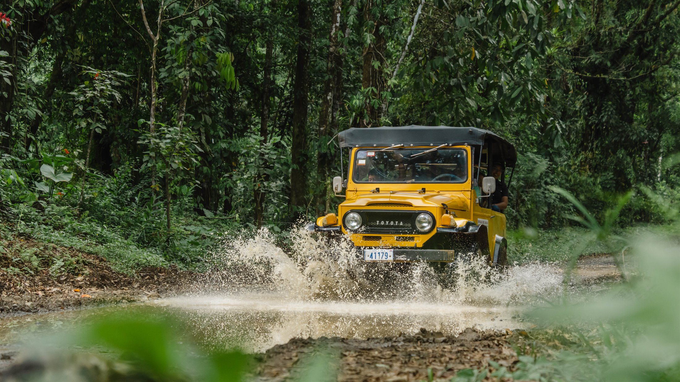 Brisas del Nara 4x4 safari crossing a mountain river
